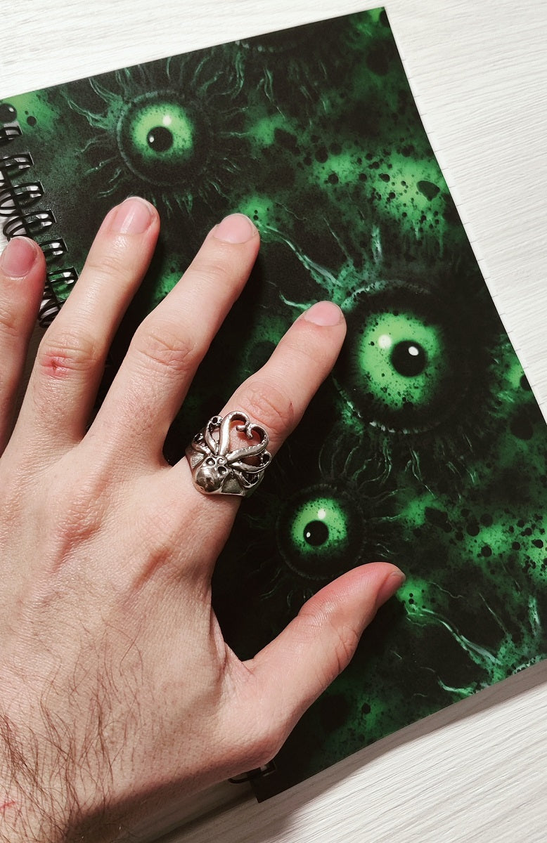 Kroužkový blok Zelené číhající oči